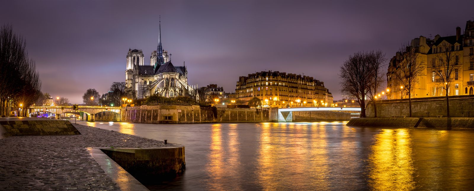Notre-Dame de Paris and the Seine at night